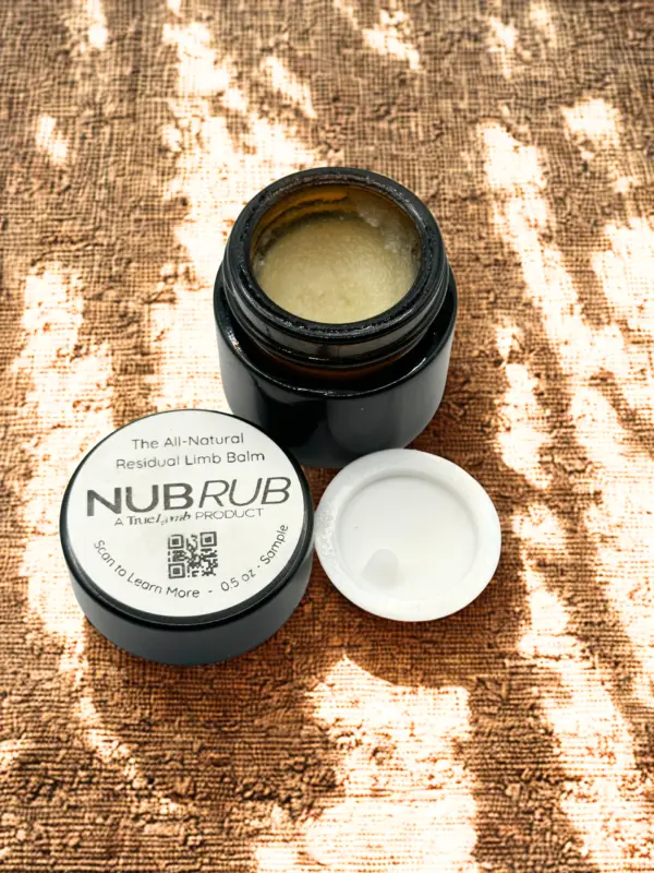 NubRub 1 oz sample jar with the lid removed, showing the balm